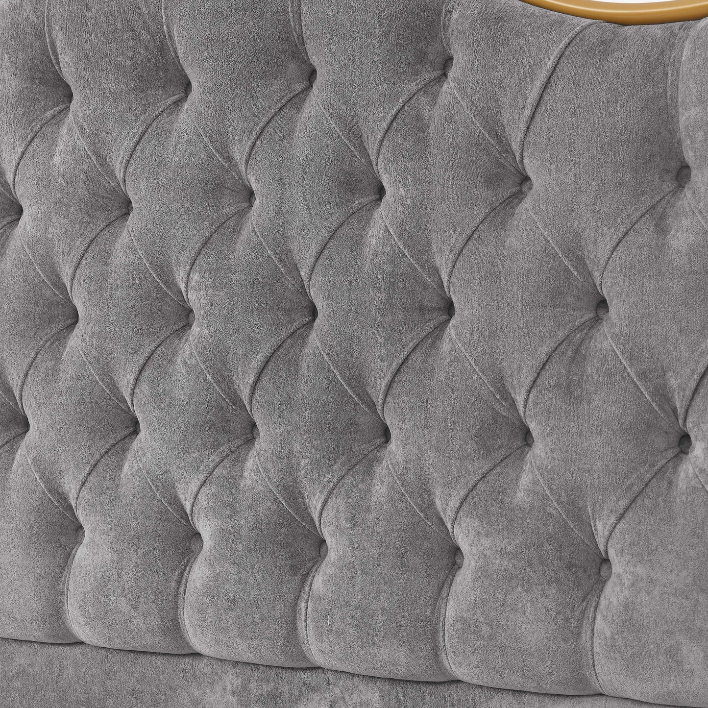 Gray tufted headboard with a textured pattern
