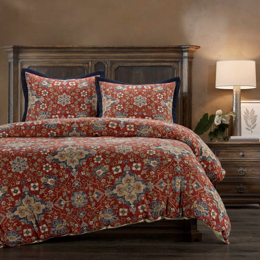 Floral patterned bedding set on a bed in a bedroom setting.