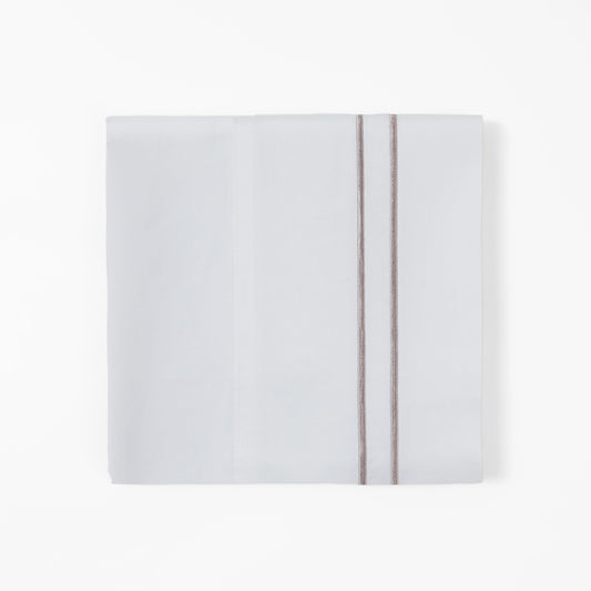 White notebook with a red ribbon on a white background