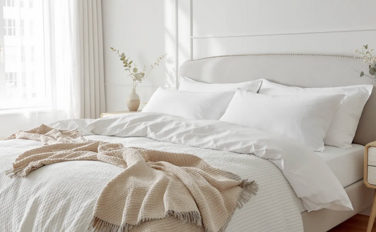 Clean white bedding and pillows