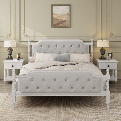 Gray upholstered bed in a bedroom setting with matching nightstands and lamps.