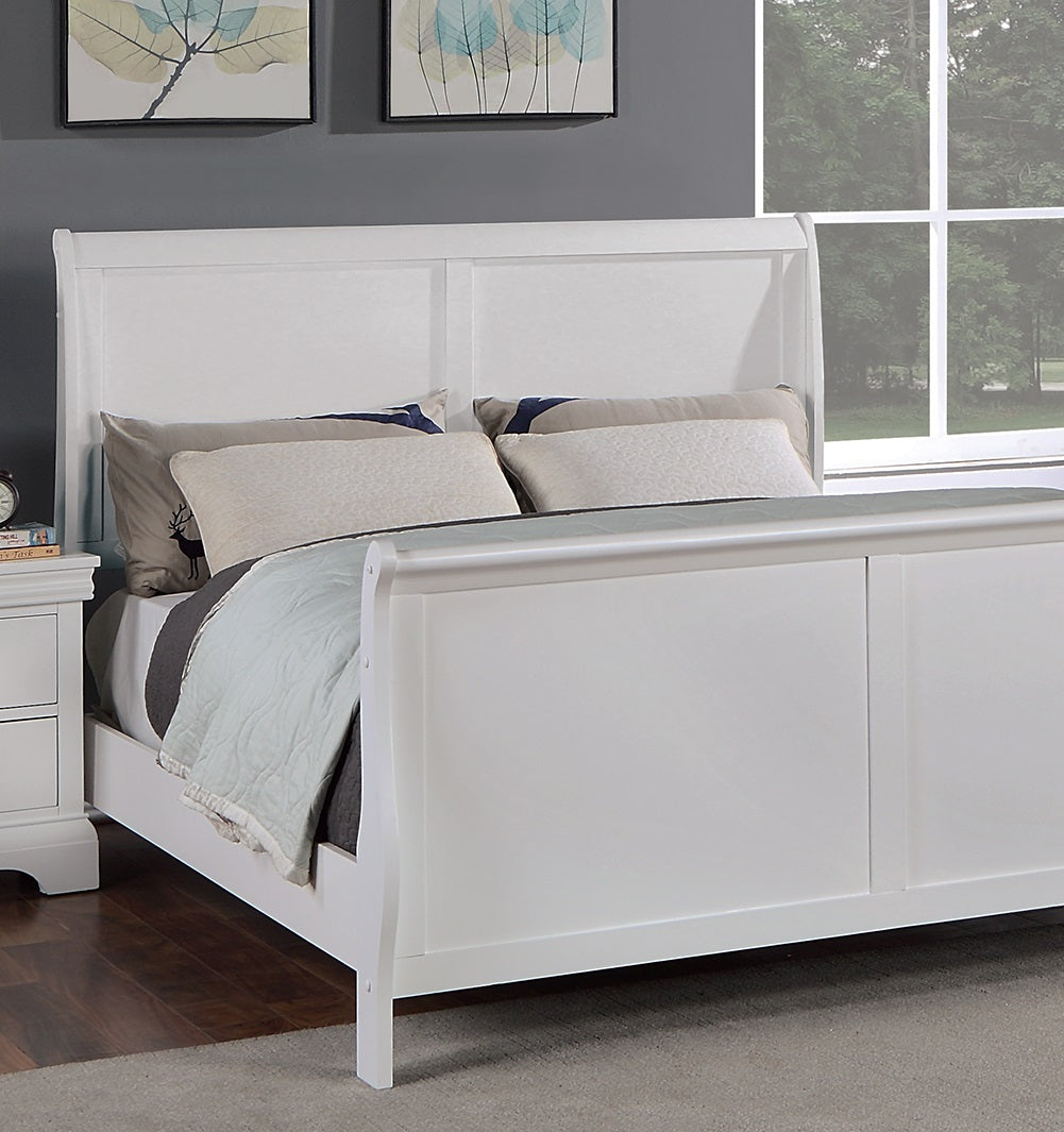 White sleigh bed with bedding in a bedroom setting