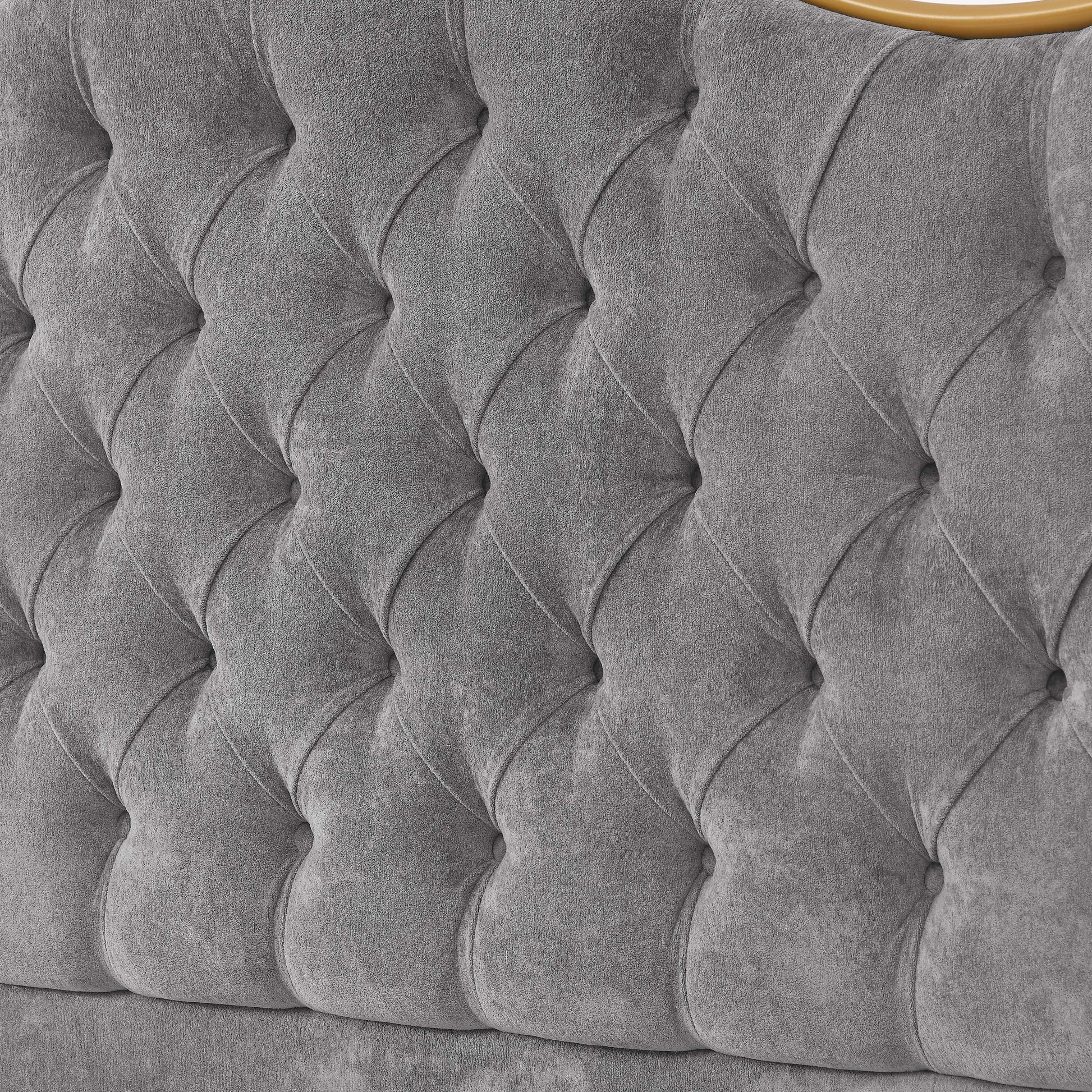 Gray tufted headboard with a textured pattern
