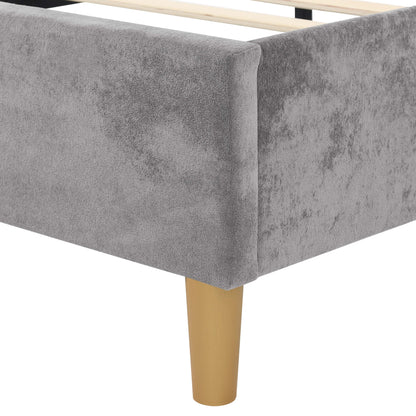 Gray bed skirt with a yellow bed frame leg on a white background