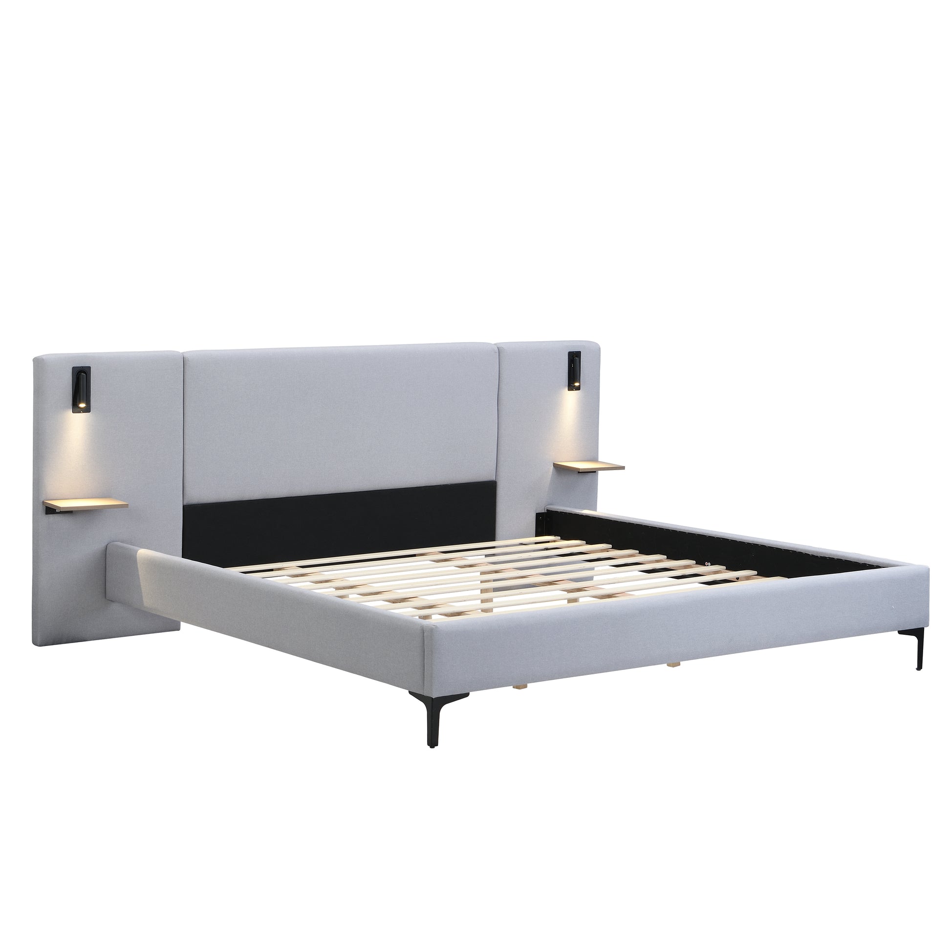 Modern bed with white upholstered headboard and black frame on a white background