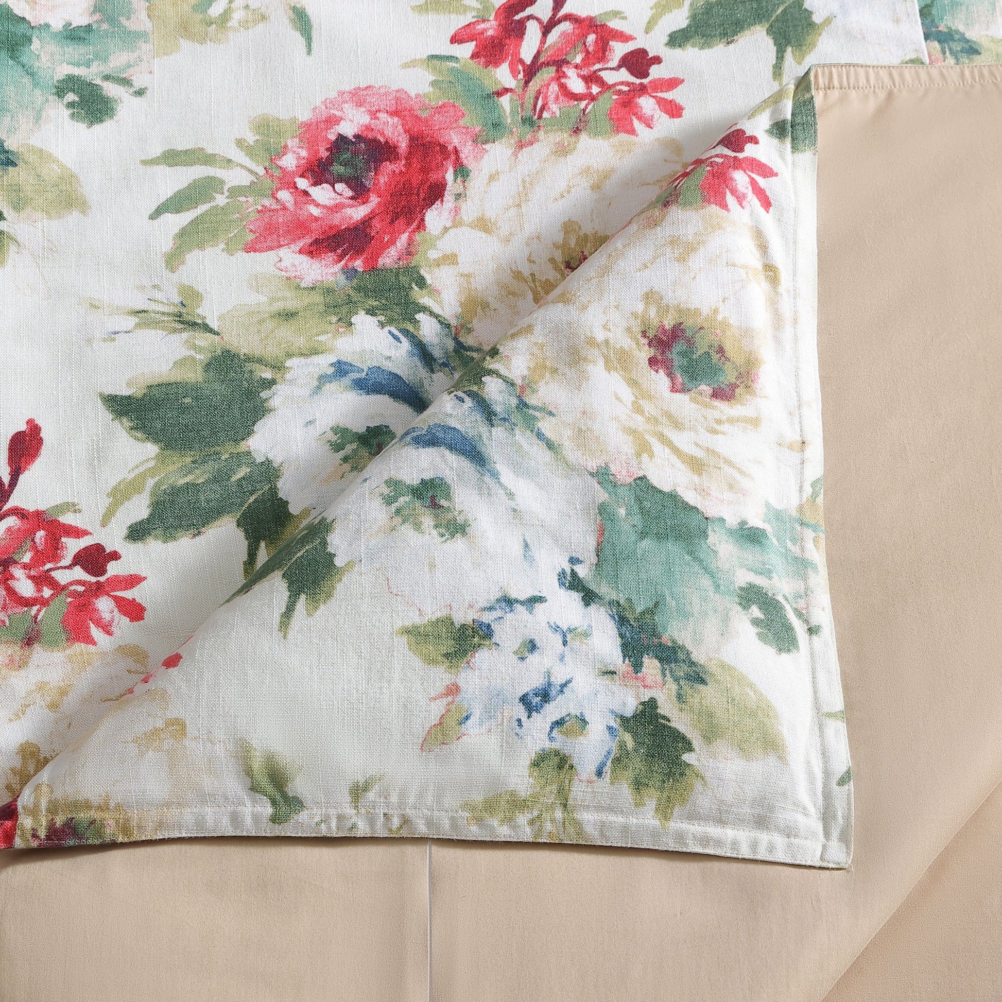 Floral patterned fabric on a beige background