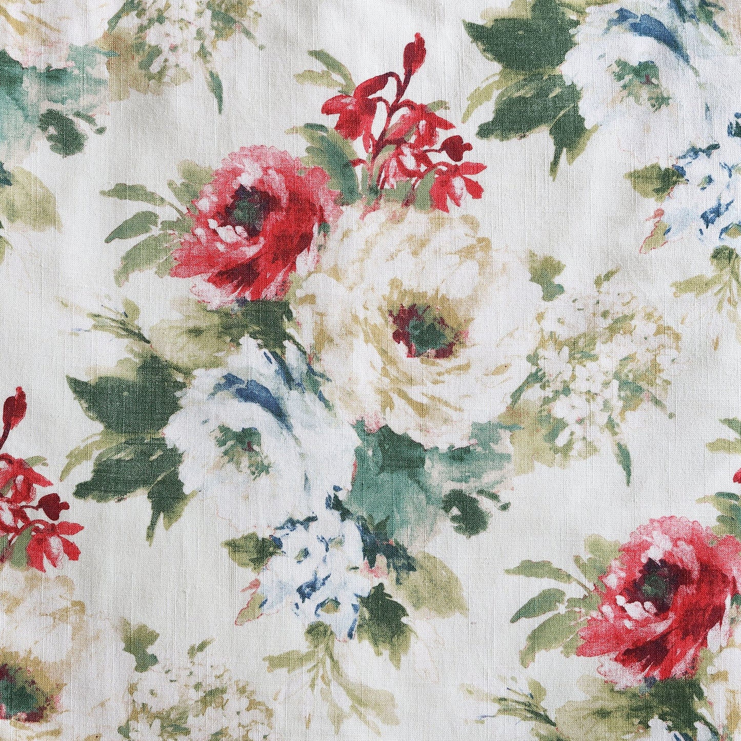 Floral pattern with red, white, and green flowers on a light background