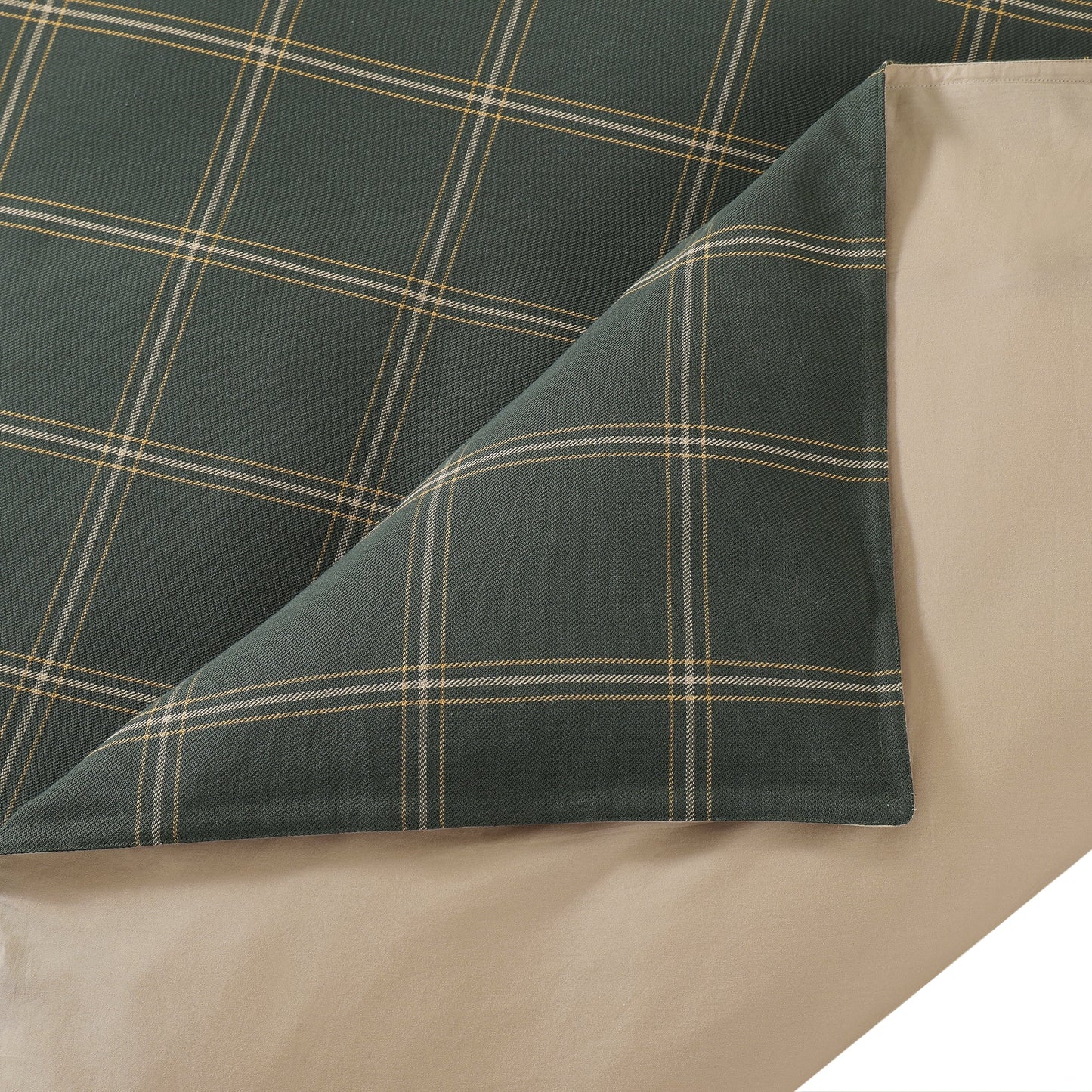 Plaid fabric with green and beige colors on a white background