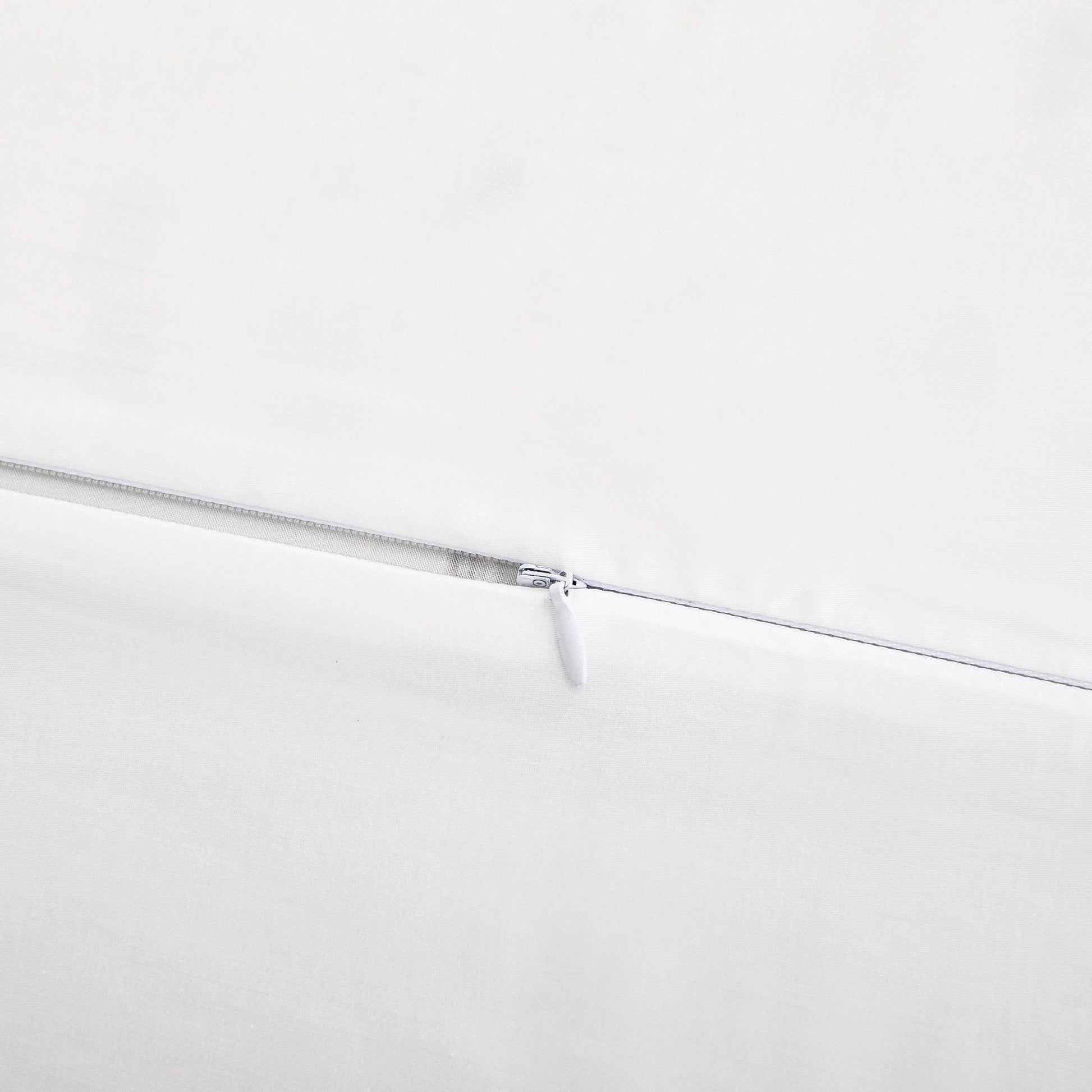 Close-up of a zipper on a white background