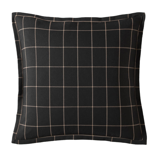 Black checkered pillow on a white background