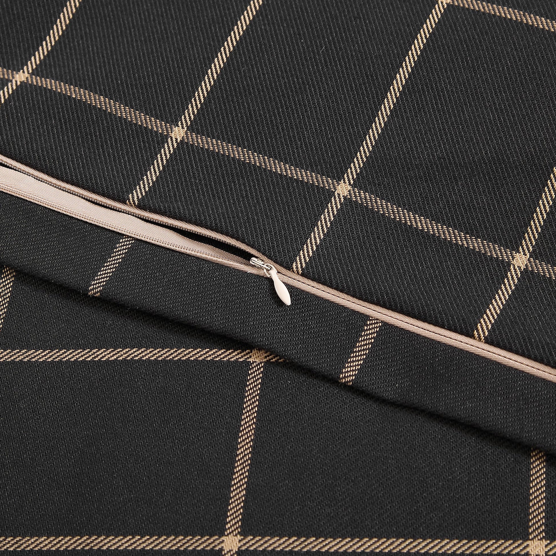 Black fabric with beige checkered pattern and zipper