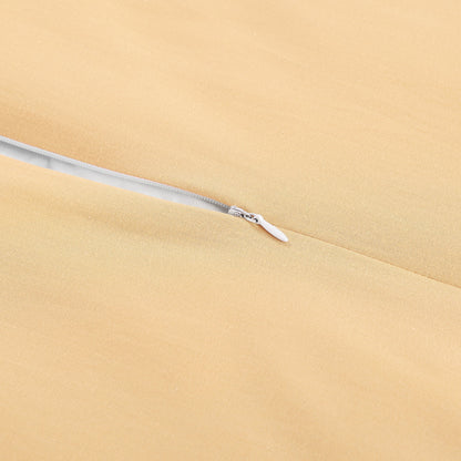 Close-up of a zipper on beige fabric