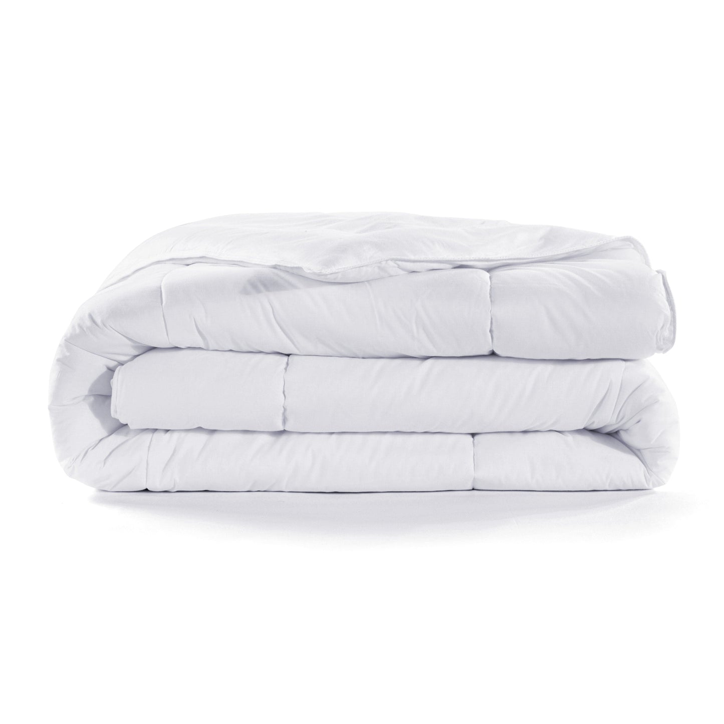 Stack of white comforters on a white background