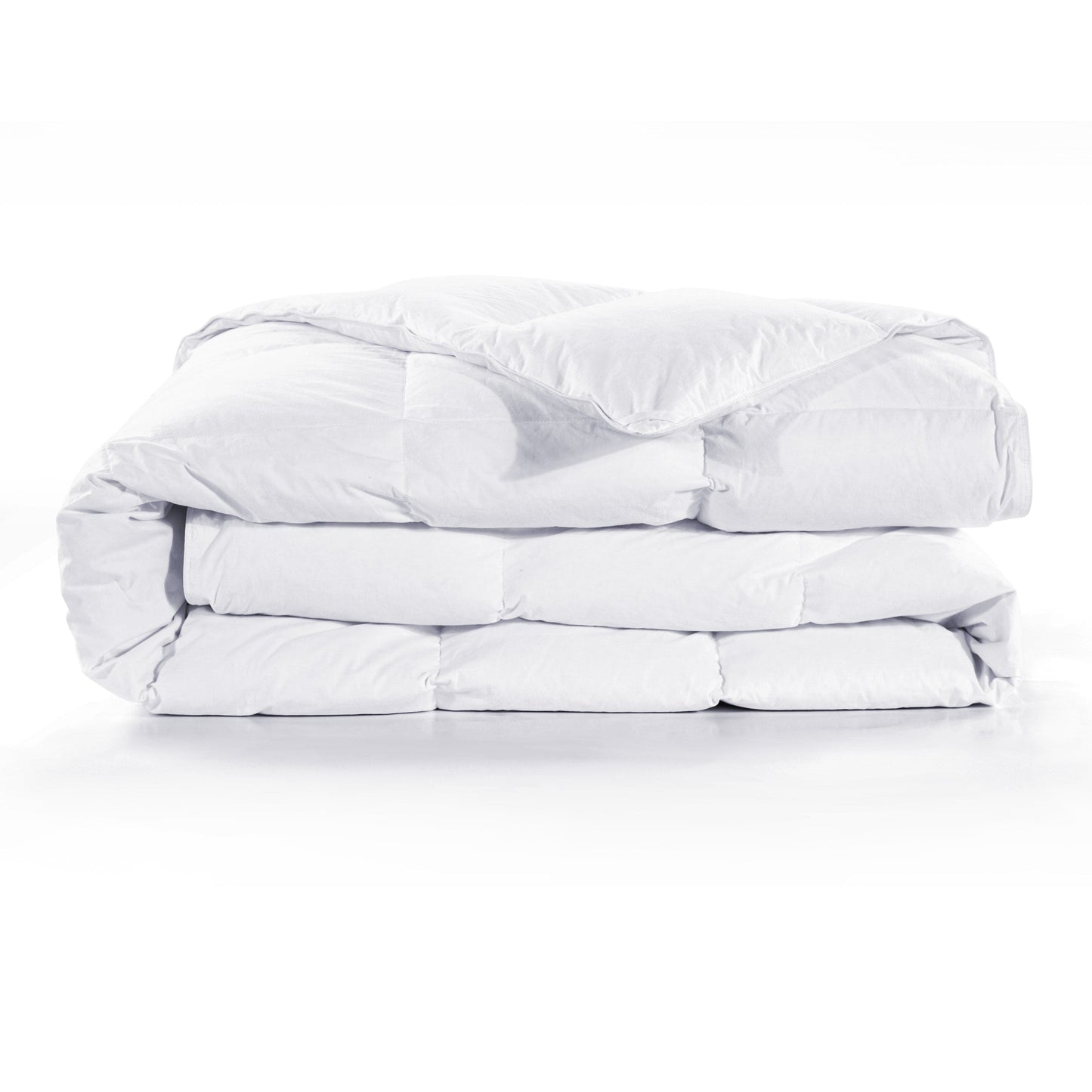 Folded white comforter on a white background
