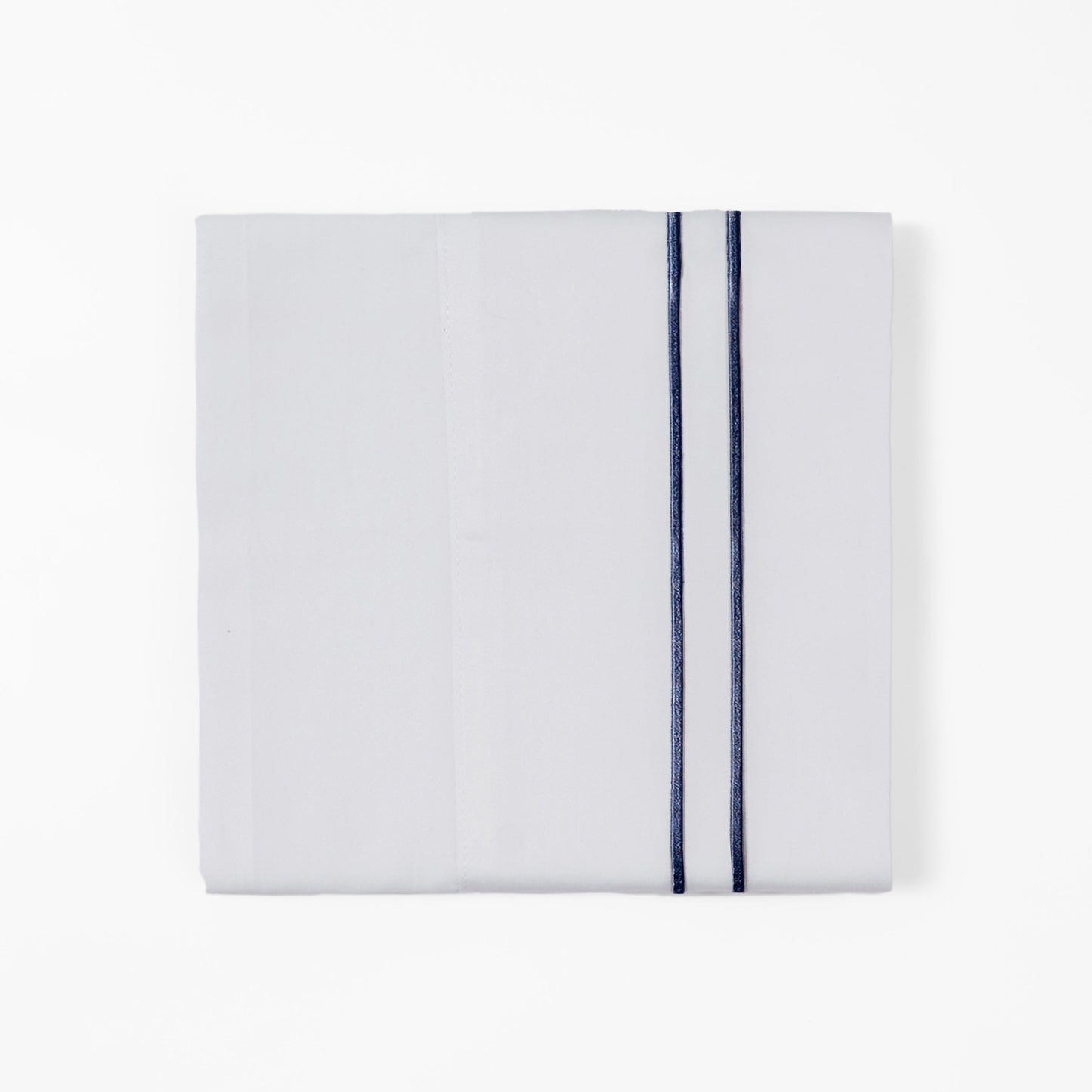 Folded white towel with a blue stripe on a white background