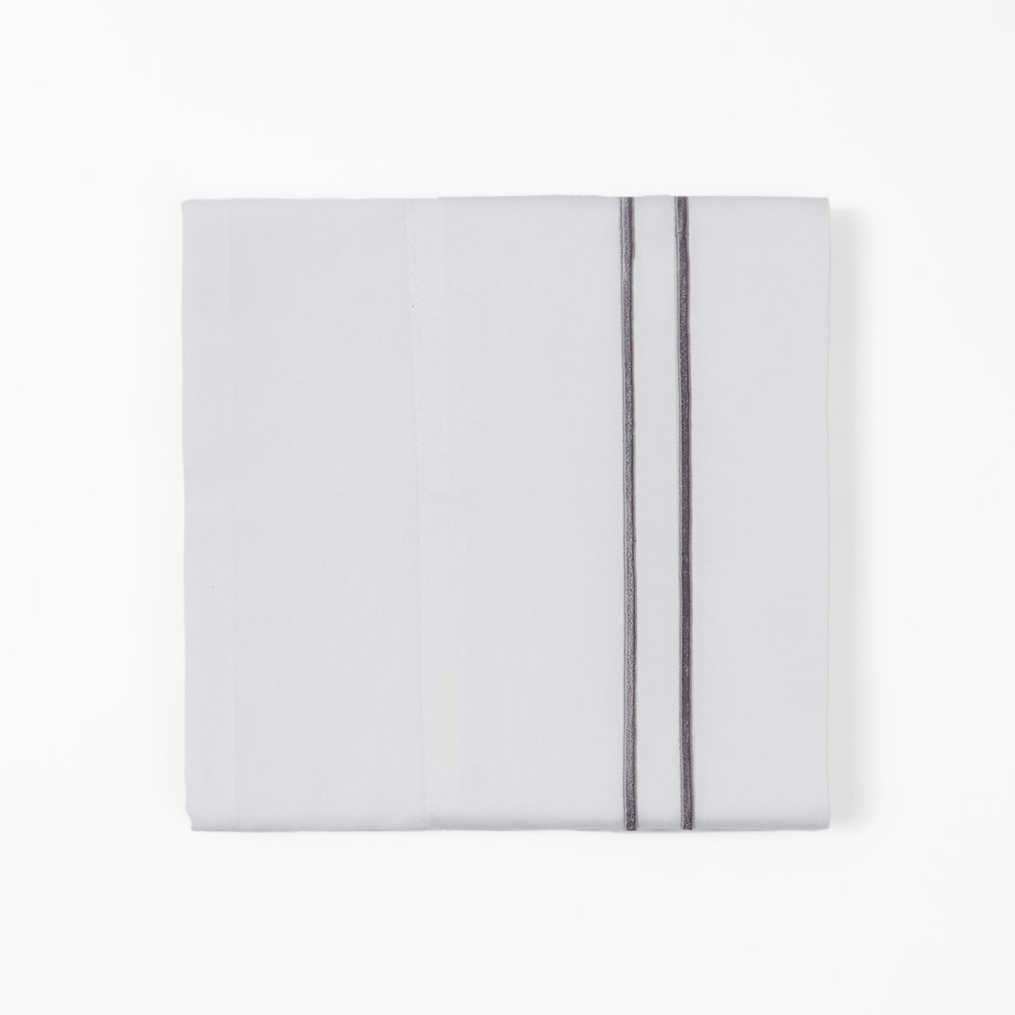 White pillowcase with a thin gray stripe on a white background