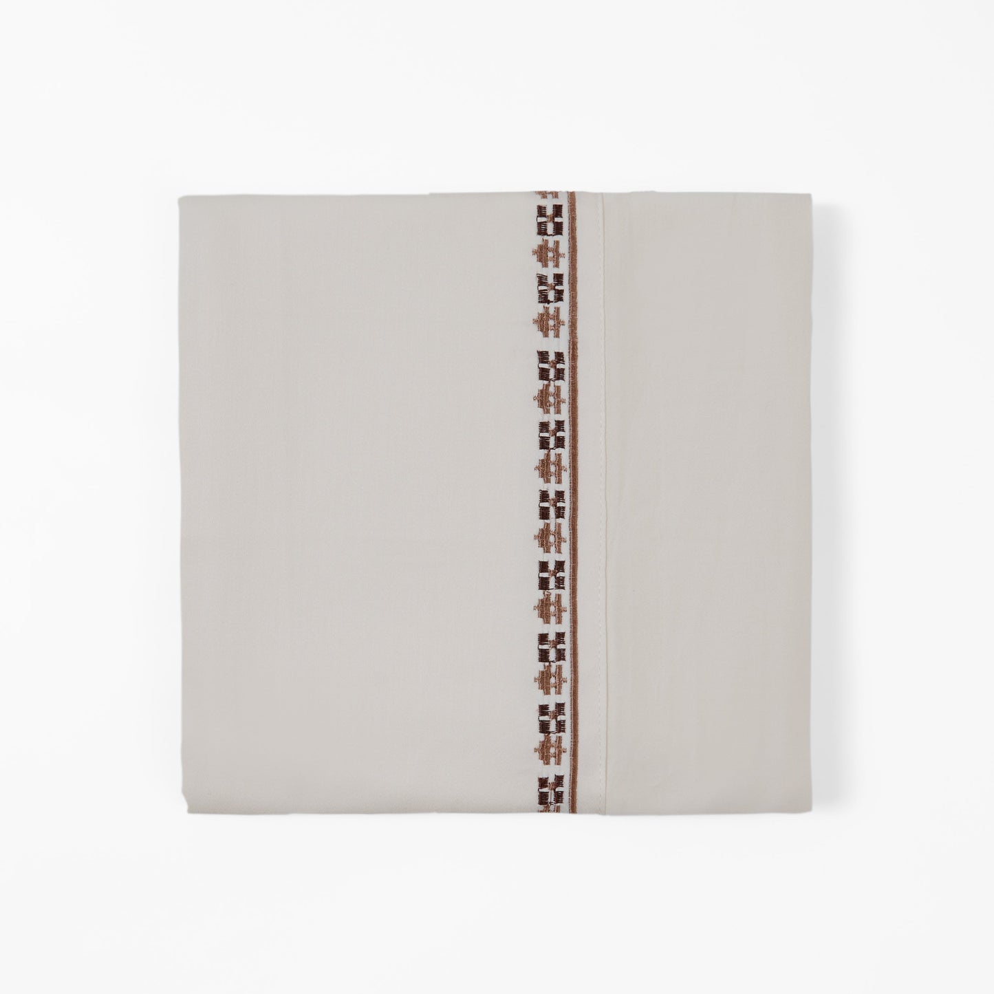 Beige fabric with a decorative brown pattern on a white background