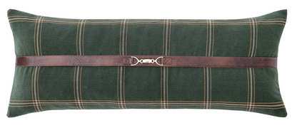 Green plaid pillow with a brown leather strap on a white background