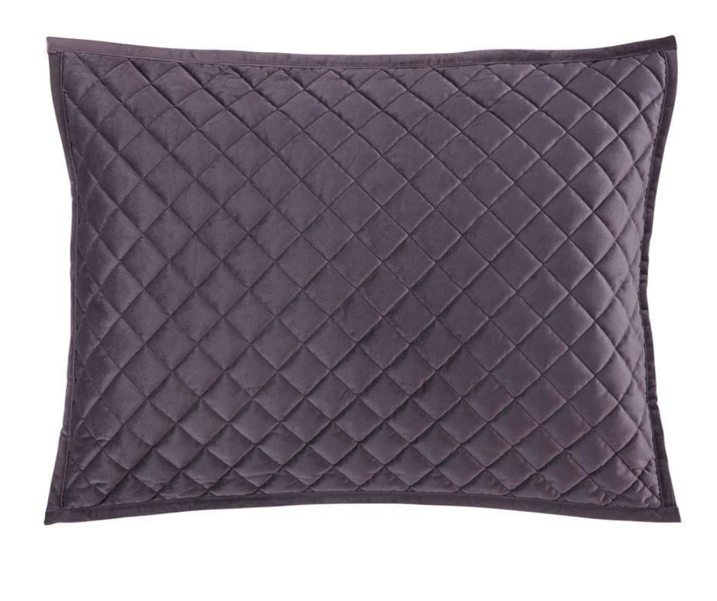 Quilted gray pillow on a white background