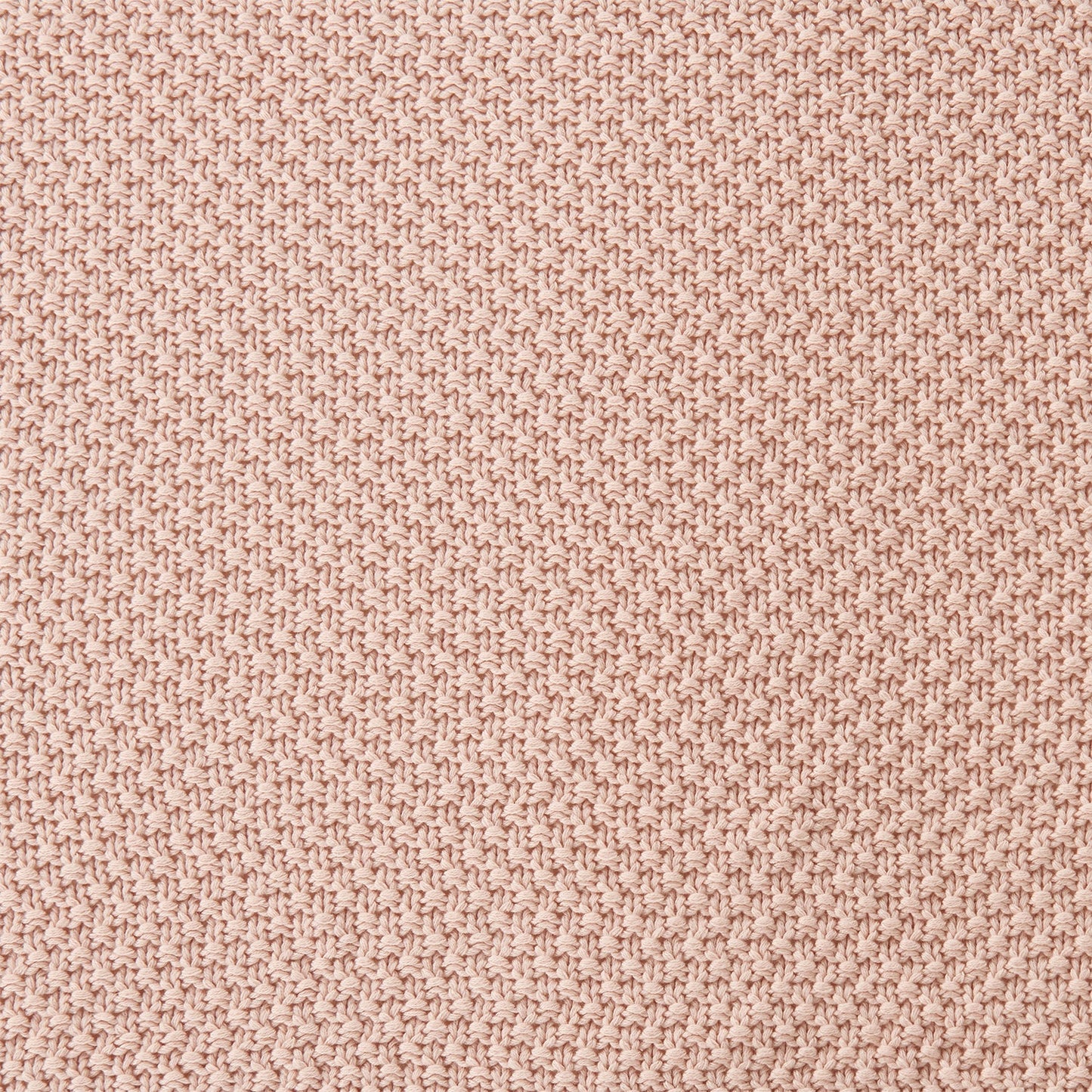 Close-up of a textured pink fabric surface