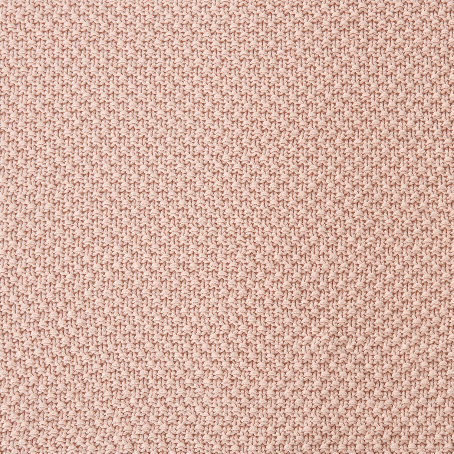 Close-up of a textured pink fabric surface