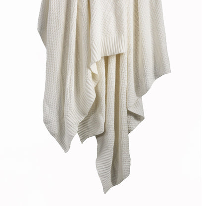 White knit cardigan on a white background