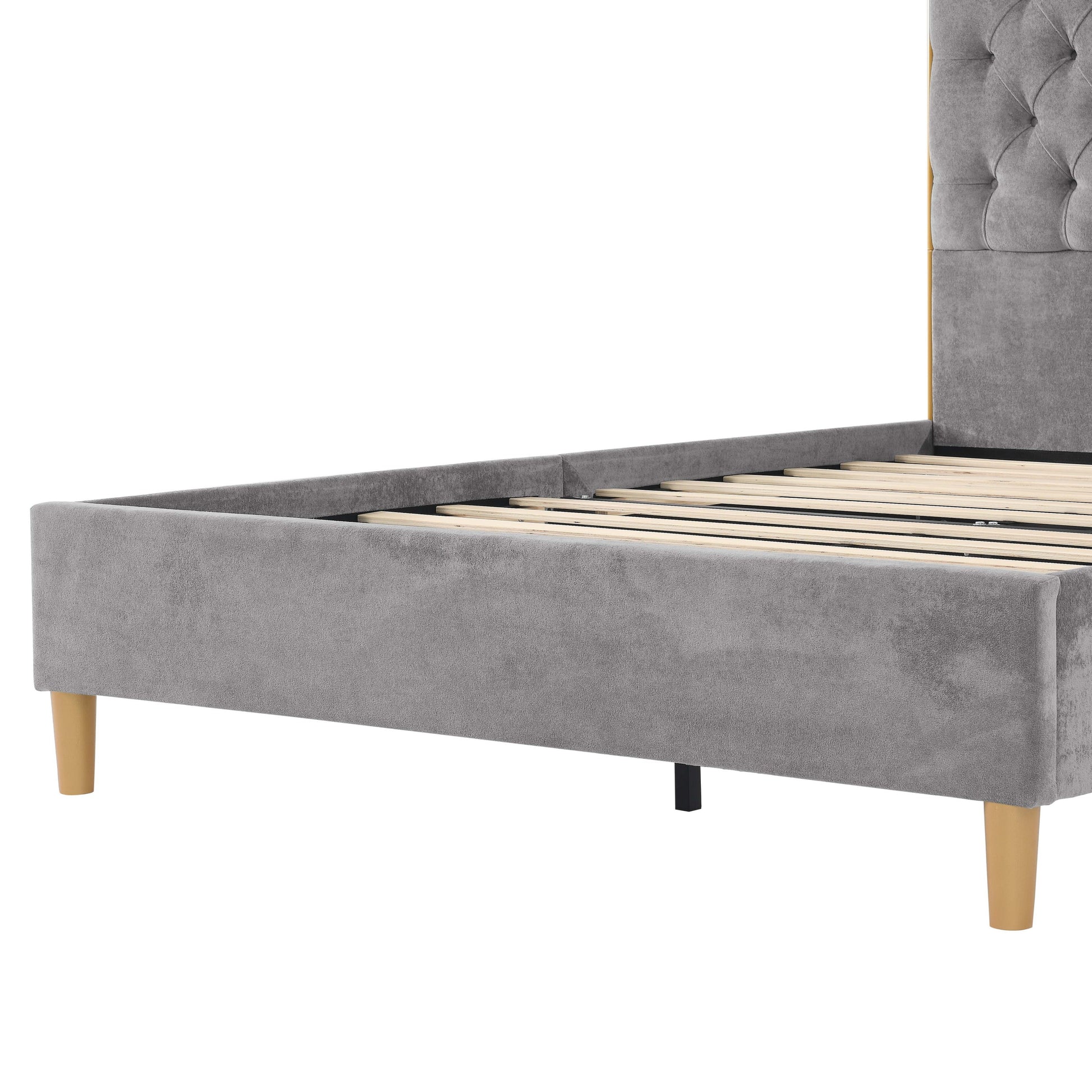 Gray upholstered bed frame with wooden legs on a white background