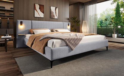 Modern bedroom with a gray upholstered bed, brown blanket, and wooden floor.
