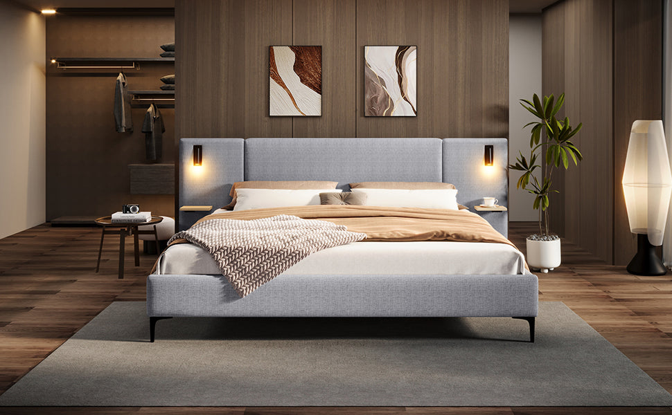 Modern bedroom with a gray bed, wooden floor, and wall art.