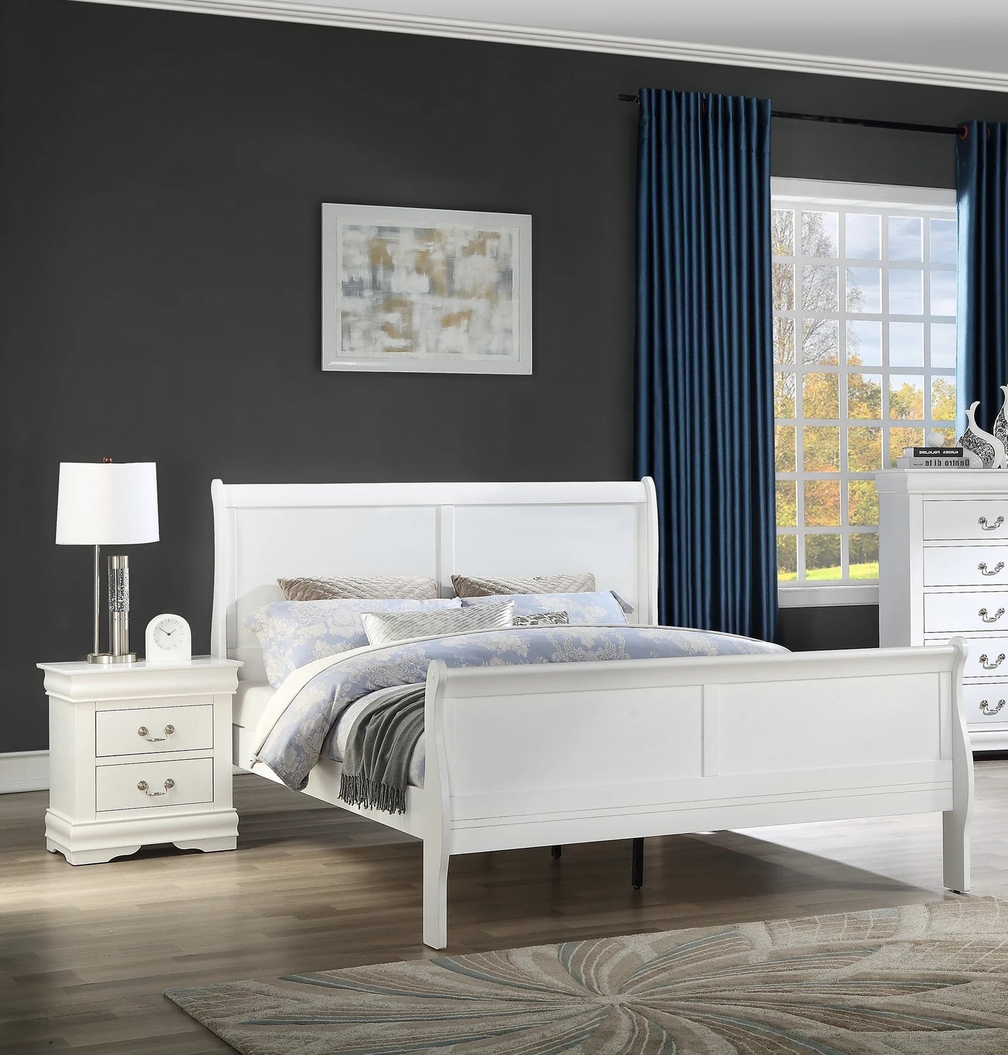 White bedroom set with bed, nightstand, and dresser in a room with dark walls and a window.