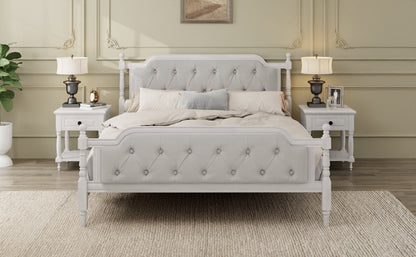 Gray upholstered bed in a bedroom setting with matching nightstands and lamps.