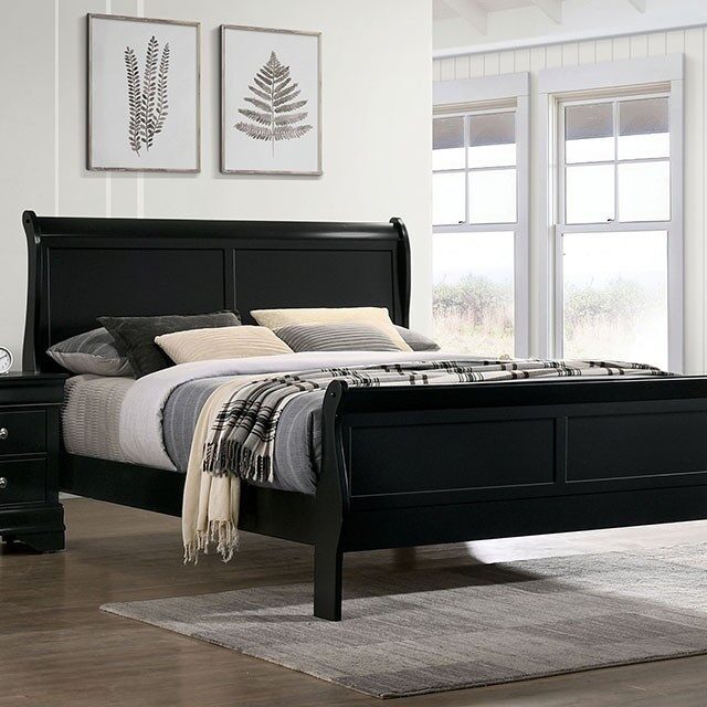 Black sleigh bed with bedding in a bedroom setting