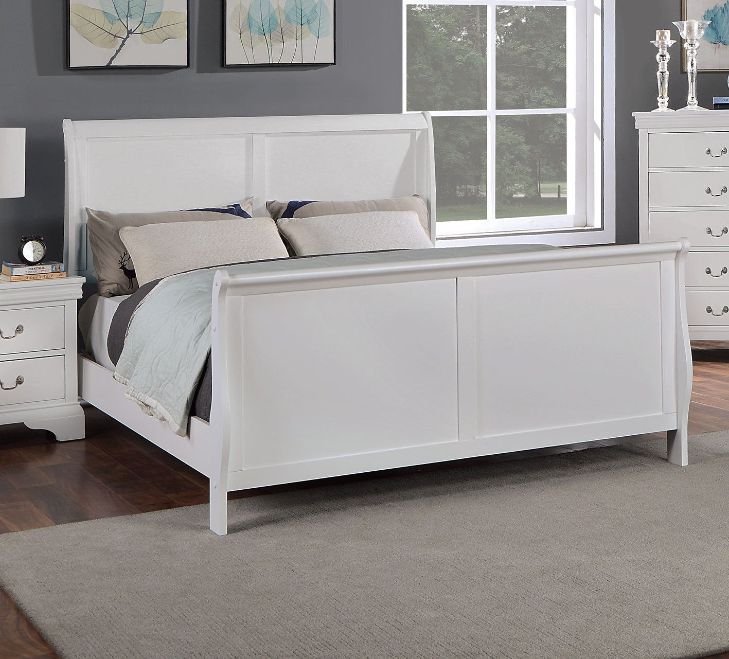 White sleigh bed in a bedroom with gray walls, a window, and nightstands.