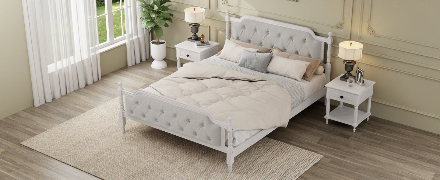 Neatly made bed in a bedroom with two nightstands and lamps.