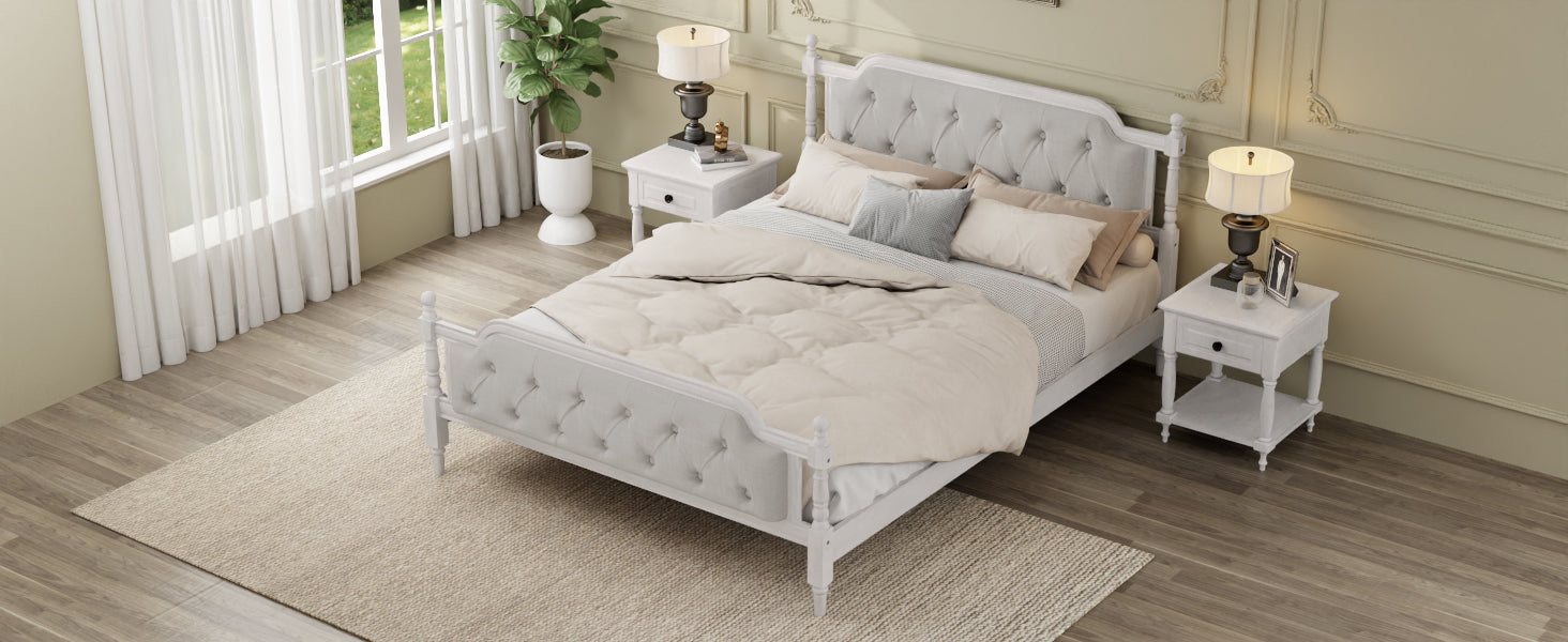 Neatly made bed in a bedroom with two nightstands and lamps.