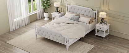 Neatly made bed in a bedroom with two nightstands and lamps.